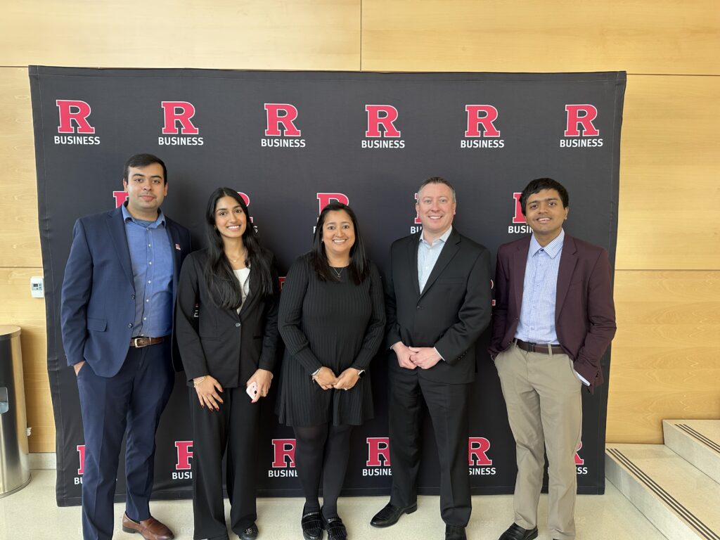 Photo from Rutgers event featuring several students and Generali's Michael Walliser and Tanya Walliser